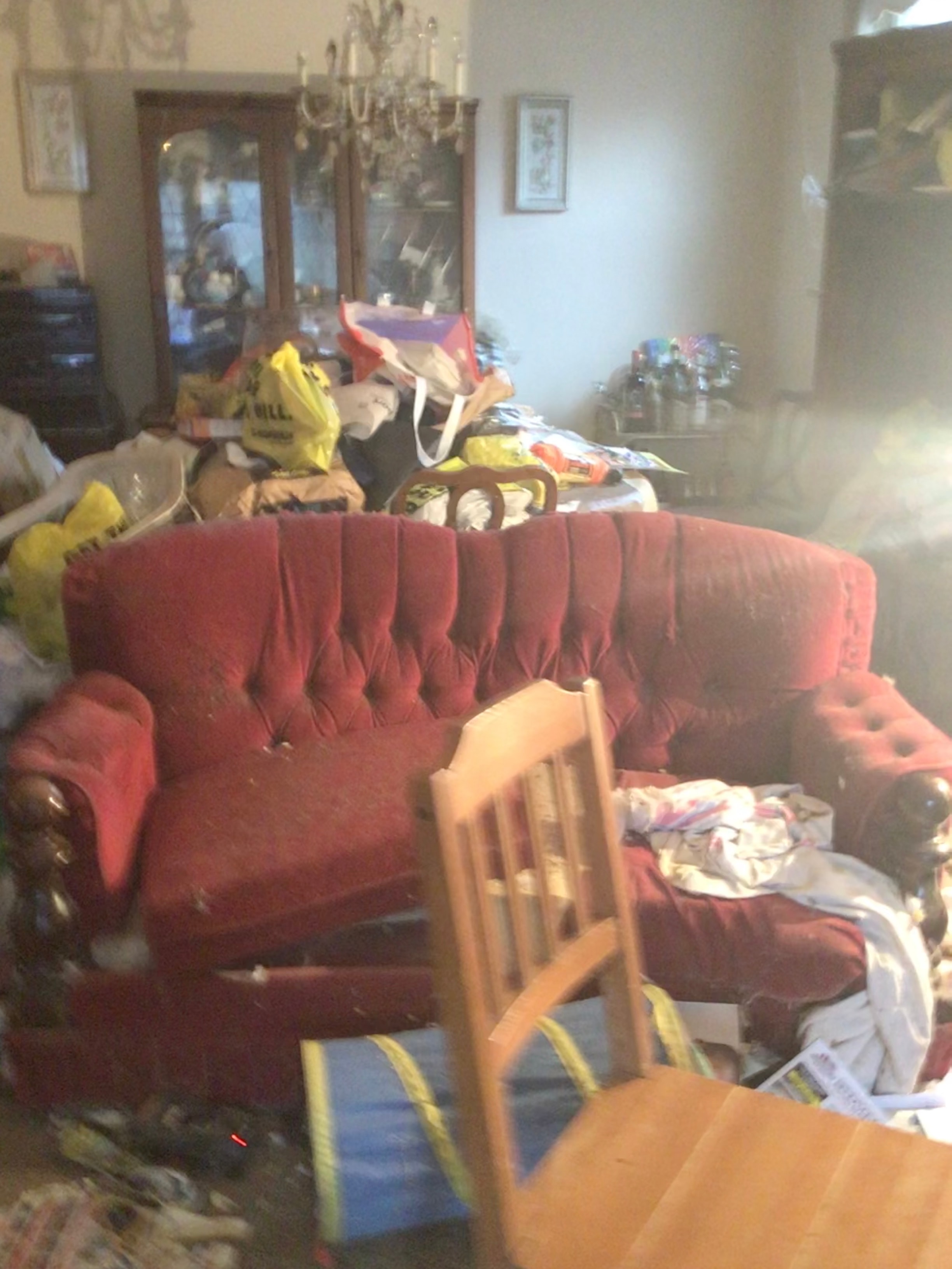 Heavily cluttered residential property — actual conditions Entrust The Care works in